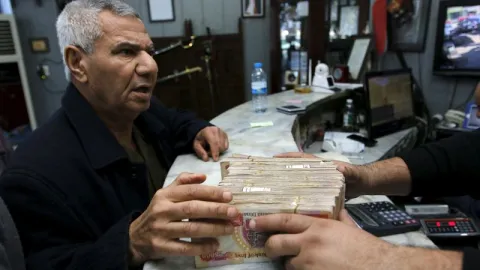 Irak'tan devalüasyon kararı