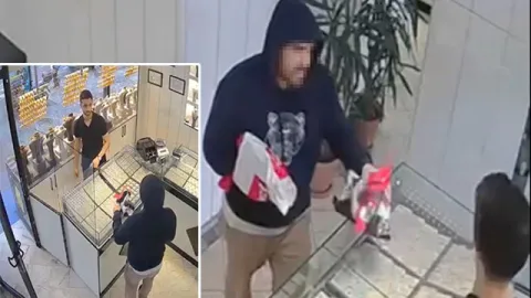 Kuyumcudan soygun anında alkışlık oyun!