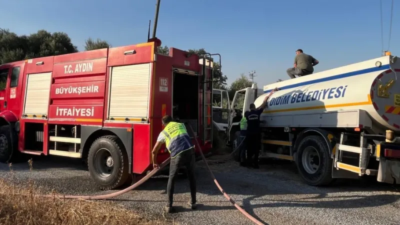 Yangın söndüren muhalife su cezası